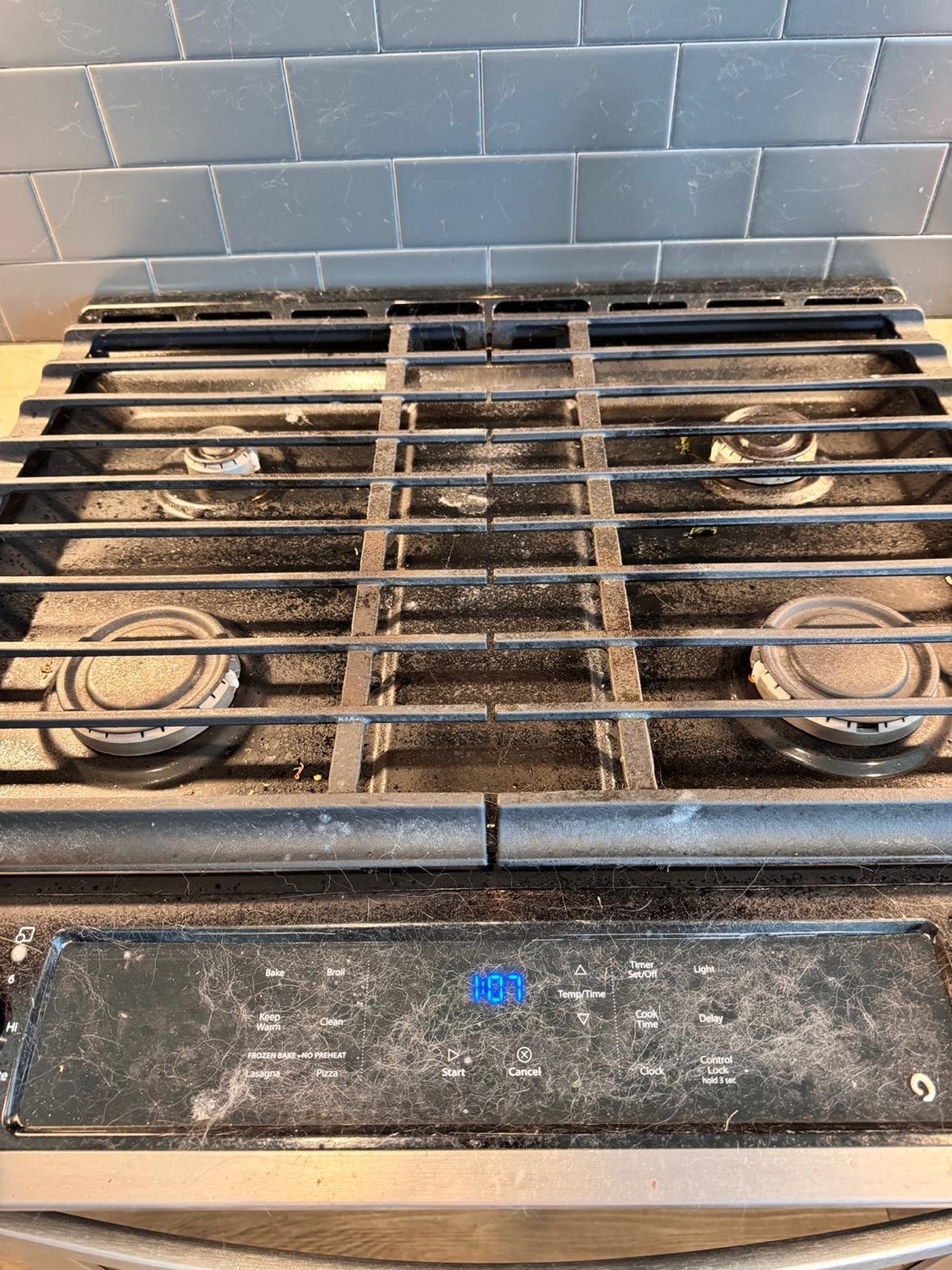 Stovetop before cleaning by Maciel Cleaning Solutions